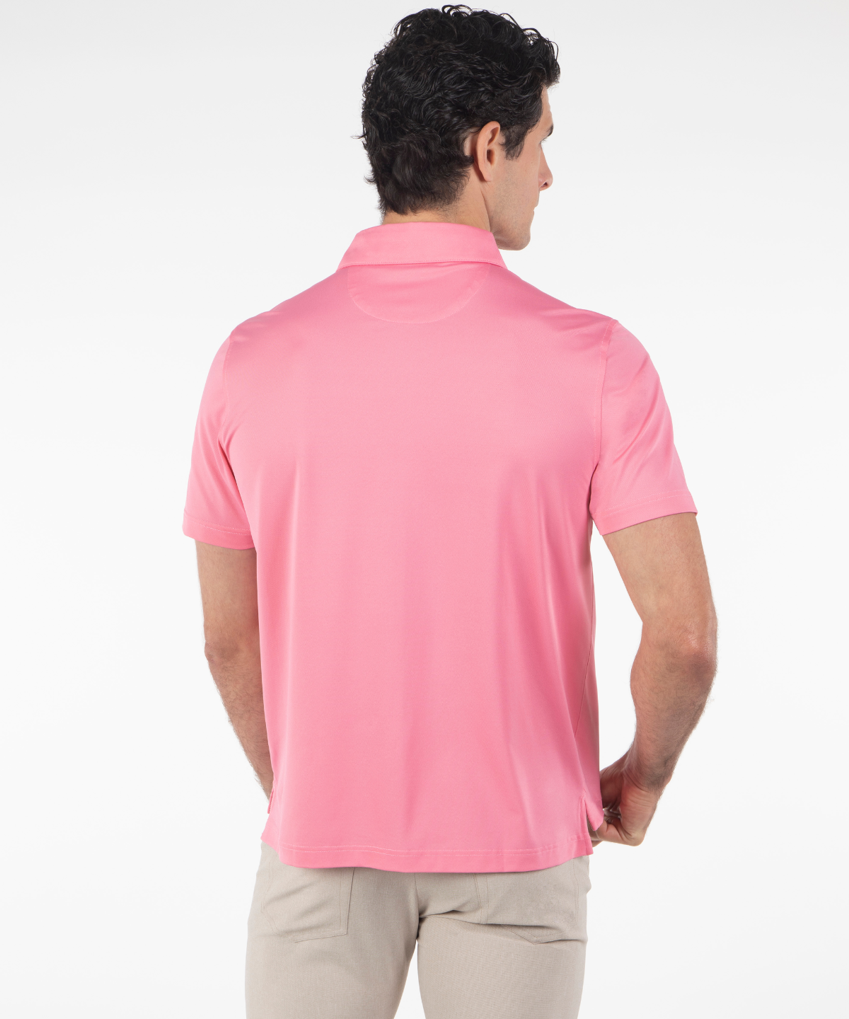 Bobby Jones pink performance short sleeve golf shirt on model